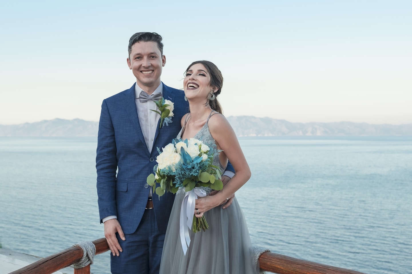 a man and a woman standing next to each other